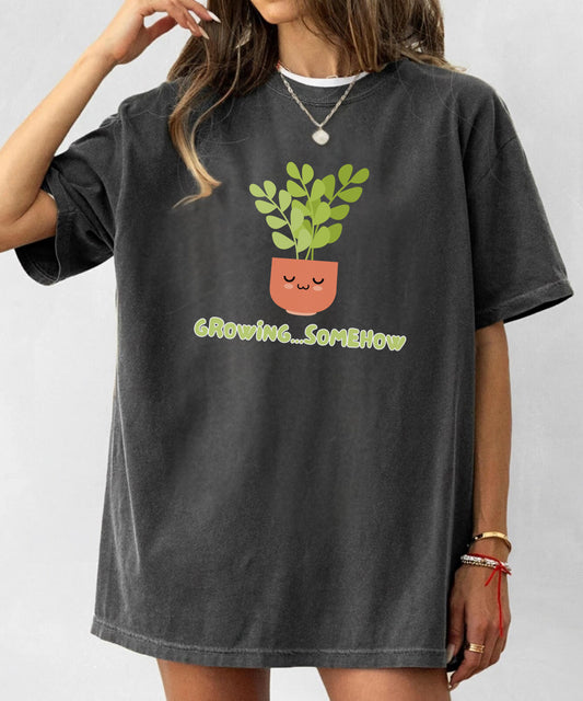 Comfort Colors® “Growing Somehow” Shirt | Cute Plant Graphic Tee, Soft Mental Health Humor, Cottagecore Aesthetic T-Shirt